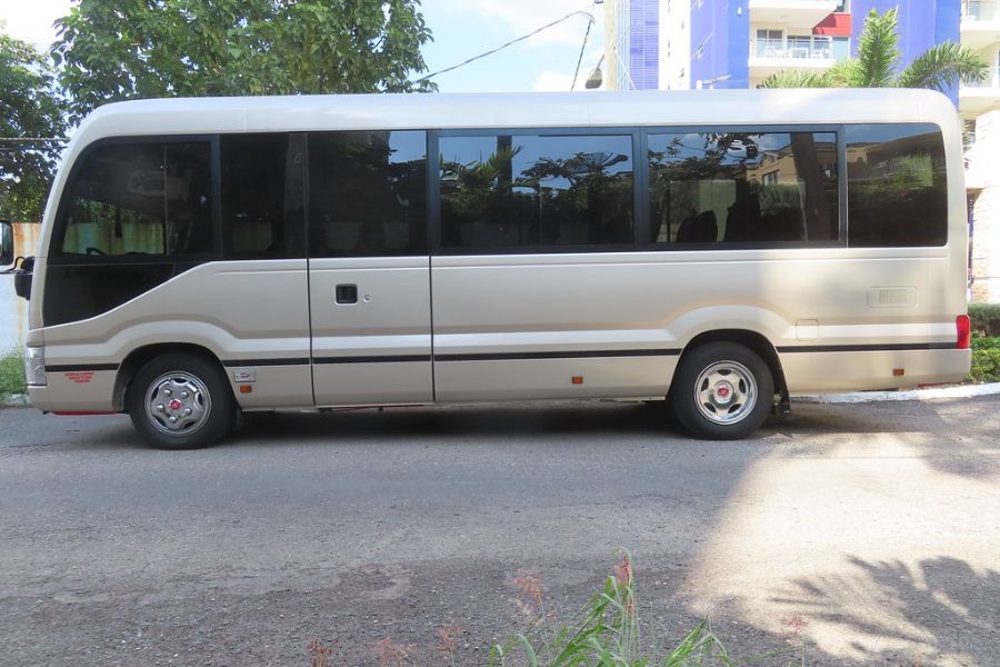 Toyota Coaster bus for Umrah groups, 17 passengers
